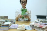Nguy cơ 'nhập khẩu lạm phát' nếu phá giá tiền đồng