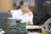 Dọn dẹp 786.000 tỉ đồng 'cục máu đông' nợ xấu